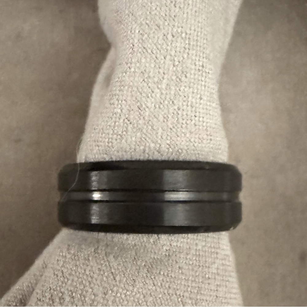 Men's Matte Black Grooved Tungsten Wedding Ring very unique.